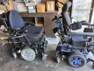 2 veterans electric mobile chairs
