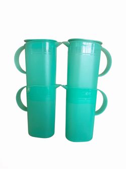 Tupperware turquoise pitchers with lids