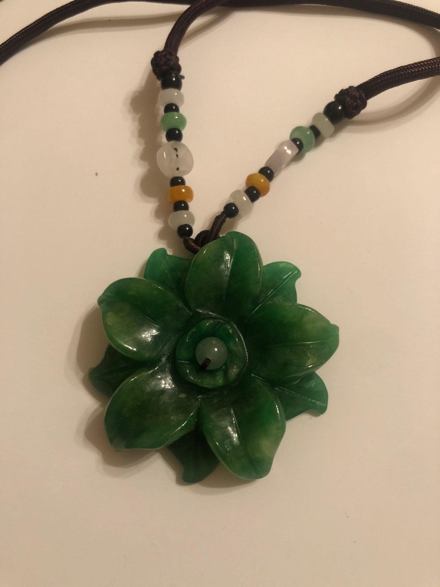 Natural jade apple green color carved flower pendant