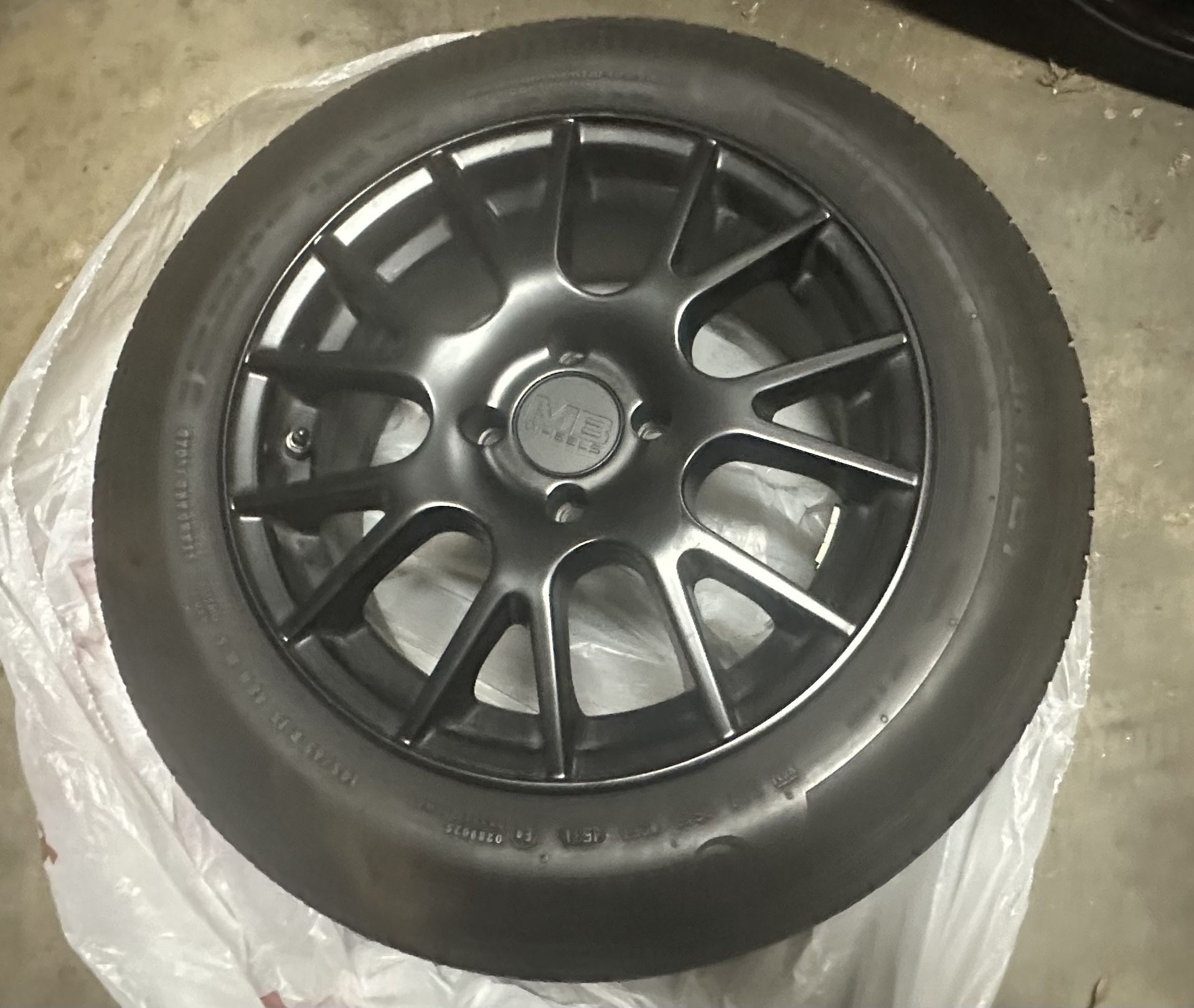 15 inch Black Rims With Tires (x4)