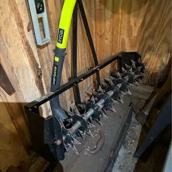 Aerator and thatcher for lawn tractor