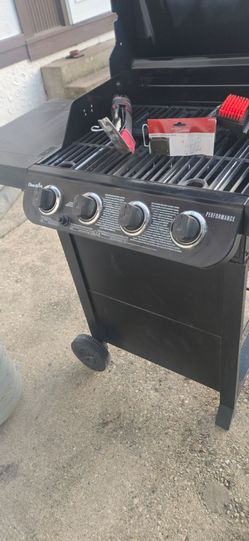 Charbroil  propane grill NEW with full thank of gas