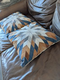 2 genuine fancy hair on hide pillows