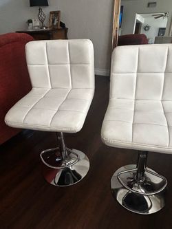 White faux leather Bar stools.