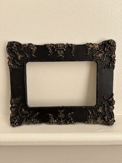 Raised detail black ornamental frame