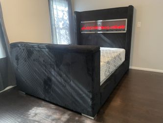 Queen-size bed with TV stand. ✔️ Only $50 down
