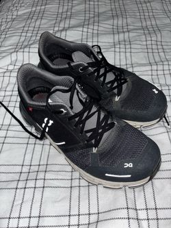 On Cloud woman running shoes