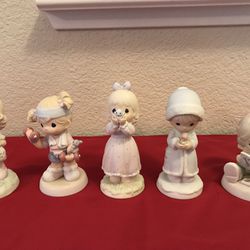 A group of 5 Vintage Precious Moments figurines