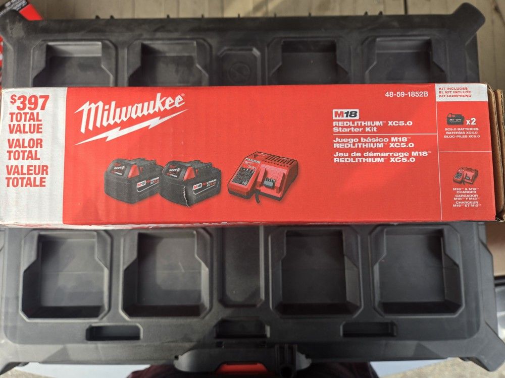 2 Milwaukee M18 XC 5.0 Batteries with Charger
