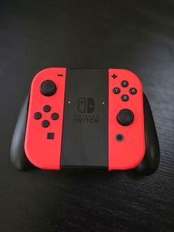 NINTENDO SWITCH NEON RED OEM  JOYCONS  WITH JOYCON GRIP