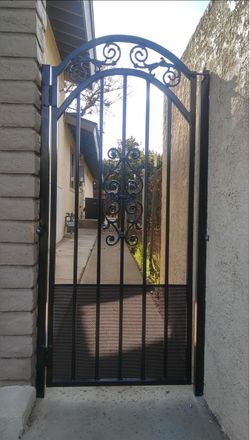 Black Wrought Iron Arched Gate