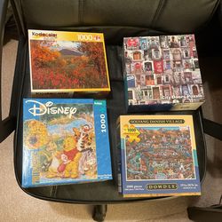 Six 1000 Piece Puzzles