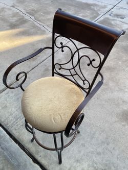 2 Brown Metal Swivel Stools