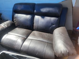 Reclining black love seat