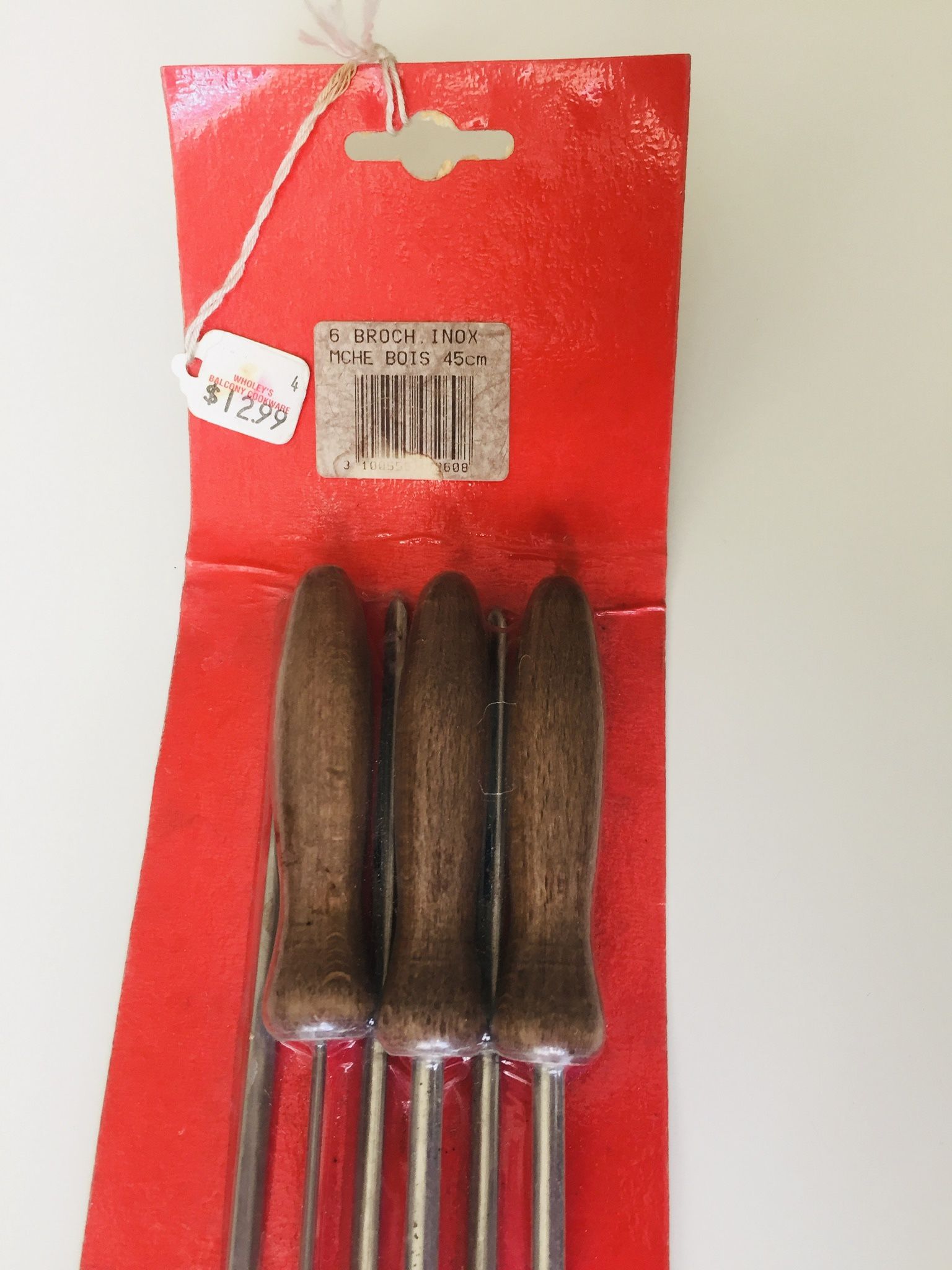 6 elegant Skewers. High quality stainless steel with solid wood handles. Absolutely new, still sealed in original packaging. Ready for your barbecue.