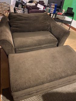 Double wide chocolate love seat with matching storage ottoman