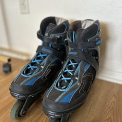 Black and Blue Inline Skates size 12 (mens) but can be used by anyone