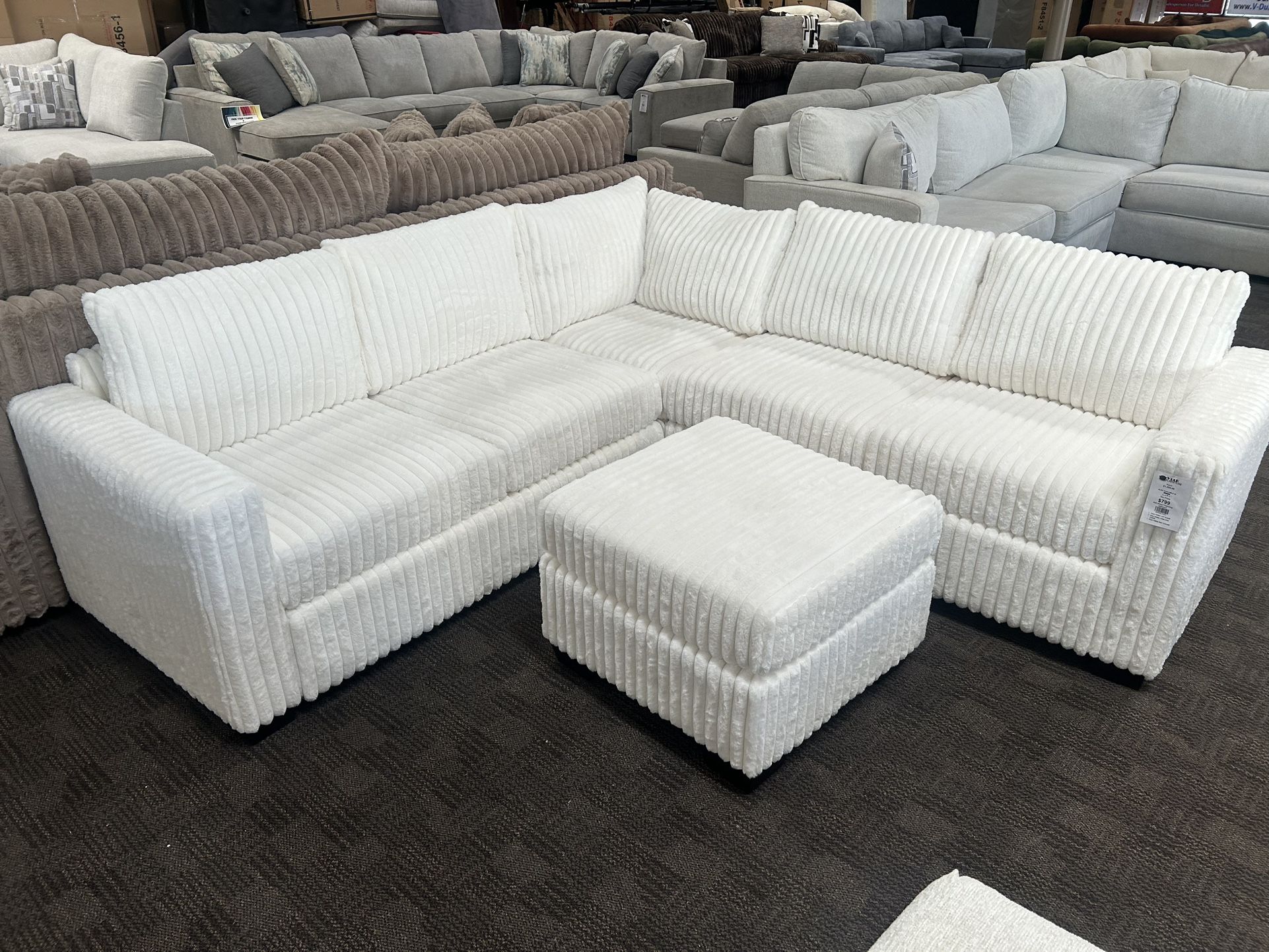 White Ivory L Shaped Sectional And Ottoman