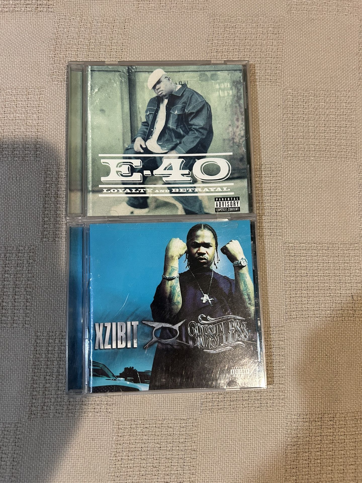 CDs, XZIVIT, E-40, Spice 1, Guns N’ Roses daz, jay Z oldies Santana