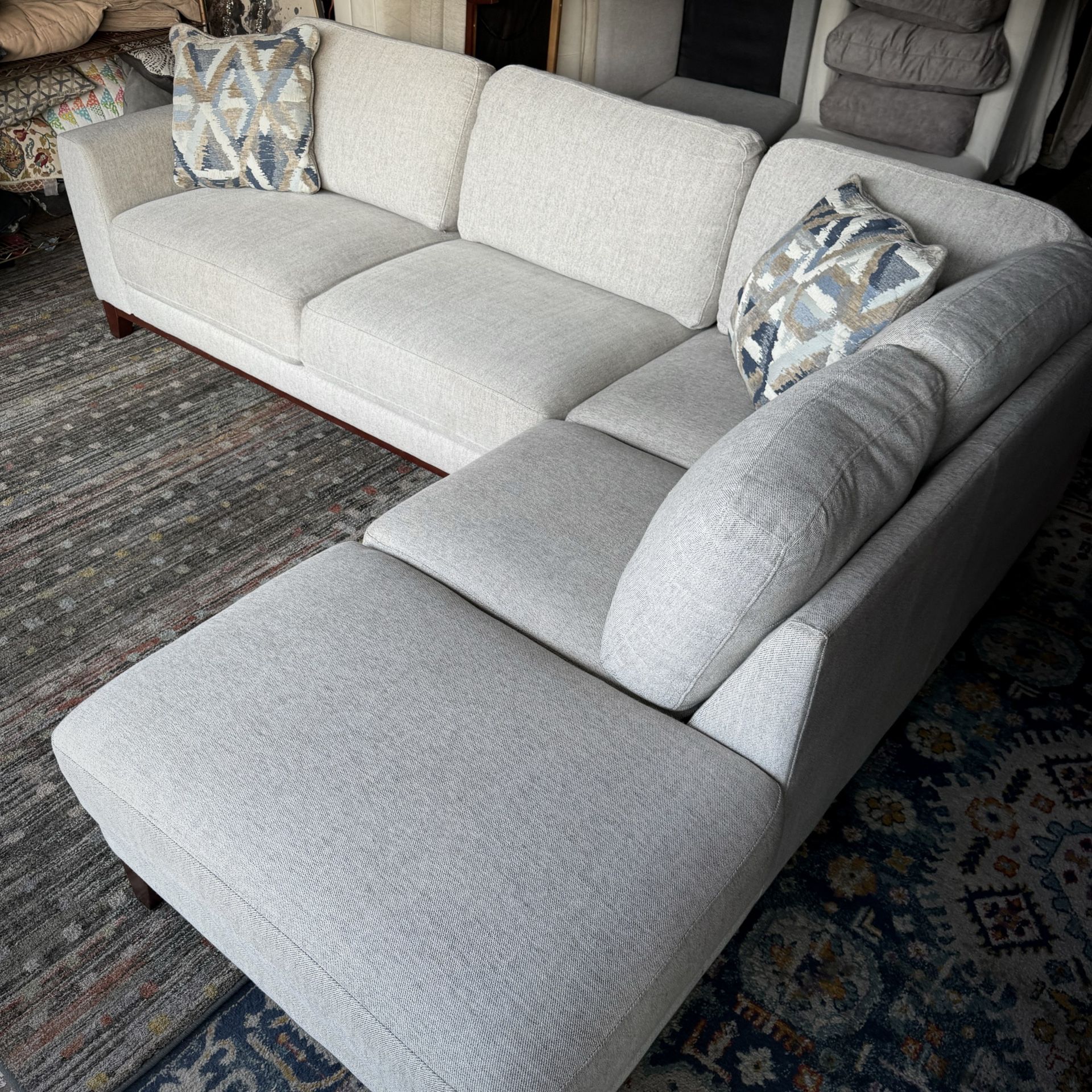 Amherst Light Gray Living Spaces Sectional Sofa with Chaise