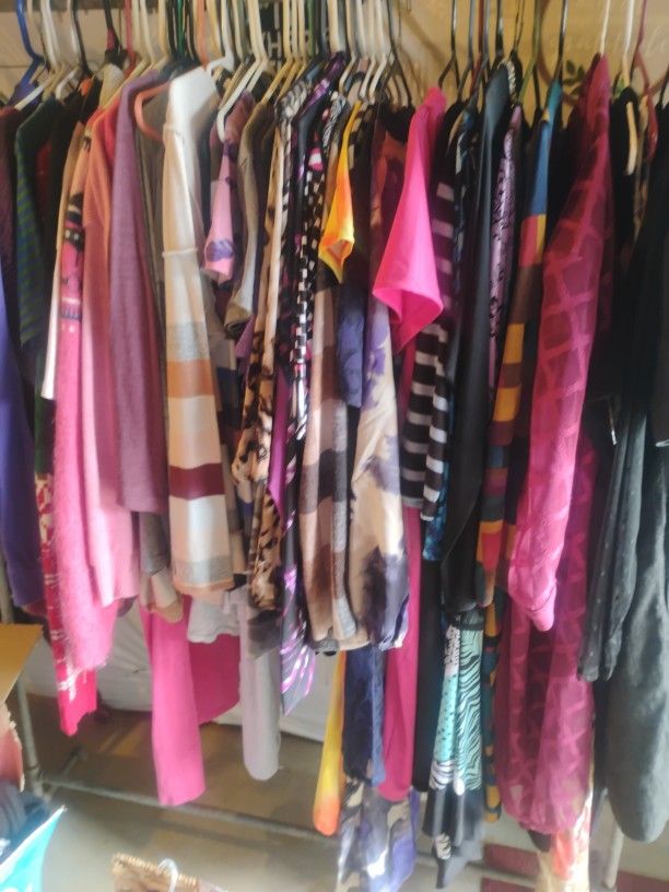 Large Rack Of Dresses For Sale Different Sizes 