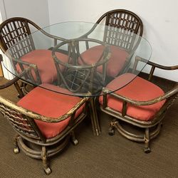 Vintage Sibley’s Bamboo Rattan Dining Table and 4 chairs on wheels. Shows age. 48” Rounded Square