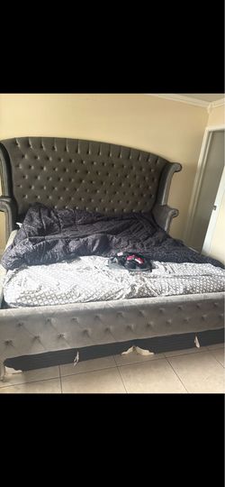 King size bed frame (mattress stained not included, free if wanted)