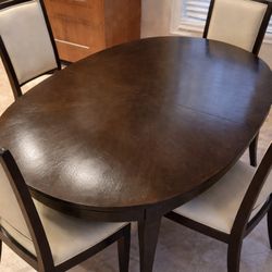 Elegant Oval Dark Wood Dining Table – Excellent Condition