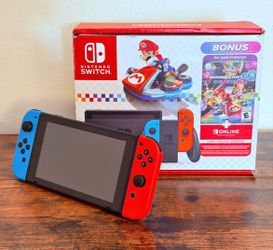 Nintendo Switch with Blue and Red Joy-Con Controllers and Mario Kart 8...