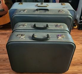 Four Piece Vintage Luggage Set