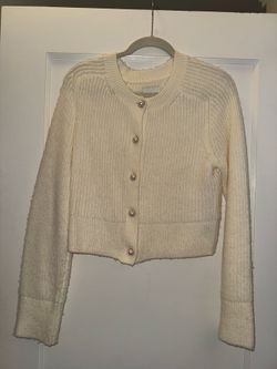 knit sweater with pearl buttons