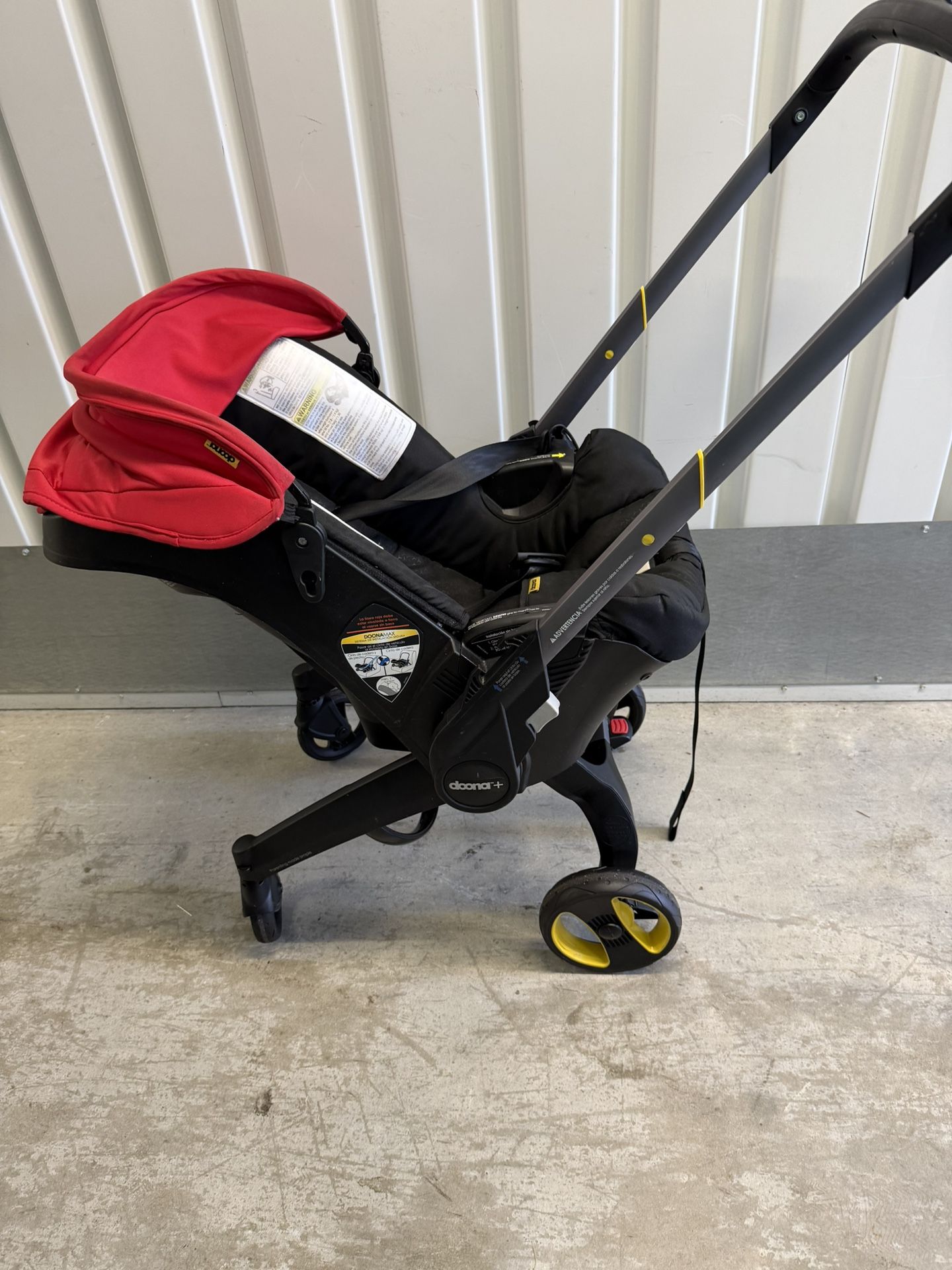 Red Doona Infant Baby Car Seat Stroller On Wheels Compact 