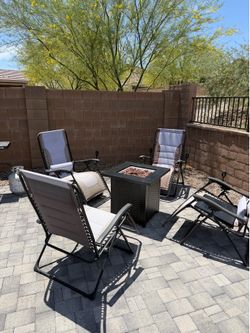 4 Zero Gravity Chairs + Gas Fire Pit Table (empty propane tank included)