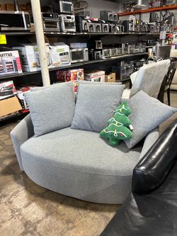 Thomasville swivel chair in grey