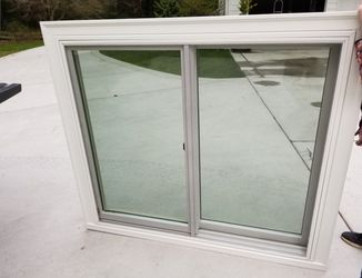 Dual sash Sliding window