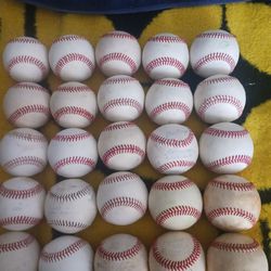 BUCKET OF "25" 90 PERCENT ALL "LEATHER BASEBALLS"  LOCATED IN GLENDORA  AND PRICE IS "FIRM"