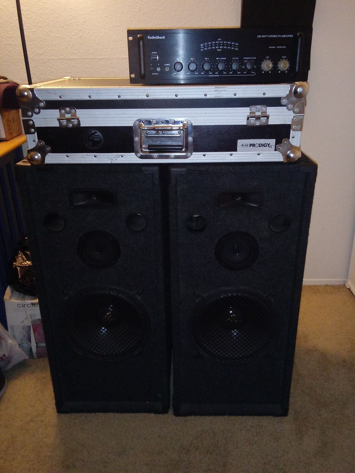 B-52 Prodigy fx CDR Dj mixer, 2- 12 inch Fisher canvass passive speakers and 250 watt Realistic Amp