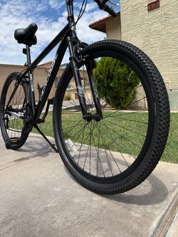 Mongoose Excursion Mountain Bike, 21-speed, 29 inch wheels, suspension fork, linear pull brakes, Black, mens size