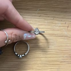 TWO small sliver rings (one Pandora one with Diamonds) 