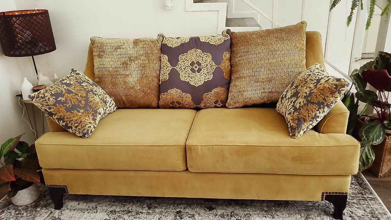 Stylish gold sofa