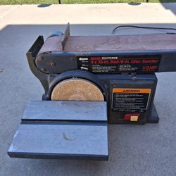 Sears/Craftsman heavy duty cast iron, 4" x 36" belt sander with 6" disk sander. 1/3 hp, 3,450 rpm's; 120 volts; 6.0 amps; model 113.226431.