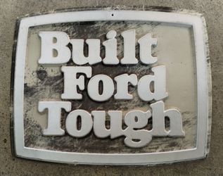 Vintage Built Ford Tough plastic embossed dealership sign, 8x10"