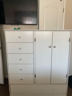 White dresser with hanging rack