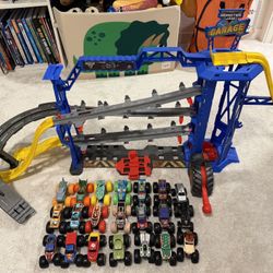 Monster Jam Garage Playset & 28 Monster Truck Toys