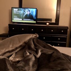 Black dresser with mirror and headboard 