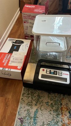 $150  Sous Vide + vacuum sealer and bags and large containers
