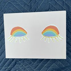 Color Curve Collection, rainbow eyelids, gold glitter lashes. Hobby lobby, 6”x8”, home decor 