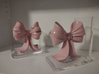 Bow bookshelf holders
