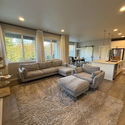 Albany Park Sectional, Armchair and Ottoman. Rug also included