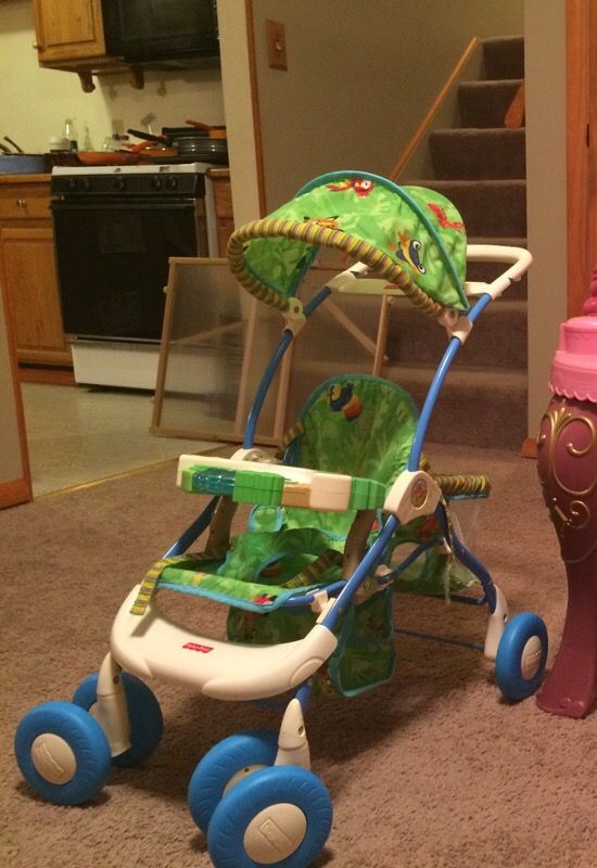 Fisher Price Rainforest 5 in 1 baby doll stroller